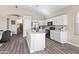 A kitchen featuring white cabinetry, an island with a sink, and stainless steel appliances at 2537 E Vista Bonita Dr, Phoenix, AZ 85024