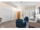 Spacious living room with a vaulted ceiling, ample seating, and a view of the front entry at 2537 E Vista Bonita Dr, Phoenix, AZ 85024