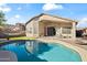 A refreshing pool surrounded by desert landscaping, creating a serene outdoor oasis for leisure and enjoyment at 2537 E Vista Bonita Dr, Phoenix, AZ 85024
