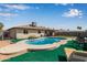 A refreshing backyard pool is surrounded by seating, perfect for enjoying sunny days at 2541 E Inverness Ave, Mesa, AZ 85204