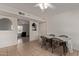 Bright dining room with tile floors, white walls, and plenty of natural light at 2541 E Inverness Ave, Mesa, AZ 85204