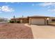 Charming single-story brick home with a spacious two-car garage and low-maintenance front yard at 2541 E Inverness Ave, Mesa, AZ 85204