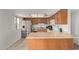 An eat-in kitchen featuring stainless steel appliances, lots of light and an island at 2541 E Inverness Ave, Mesa, AZ 85204