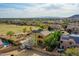 Aerial view of the house featuring a pool, solar panels and beautiful desert landscape at 25453 N 68Th Ln, Peoria, AZ 85383