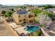 Aerial view of a two-story home with a pool, patio, and lush landscaping at 25453 N 68Th Ln, Peoria, AZ 85383