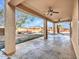 Covered patio with ceiling fans overlooks a private backyard and in-ground pool at 25453 N 68Th Ln, Peoria, AZ 85383