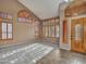 Inviting living room showcasing high ceilings, unique windows with shutters, and neutral colors at 25453 N 68Th Ln, Peoria, AZ 85383