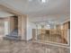 Open-concept space featuring a staircase, railing, and view into the Gathering room at 25453 N 68Th Ln, Peoria, AZ 85383