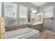 Bright bathroom with soaking tub, dual sink vanity, and walk-in shower at 2617 S Jeffry St, Gilbert, AZ 85295