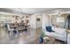 Open-concept living room with kitchen view, dining area, and stylish contemporary furnishings at 2617 S Jeffry St, Gilbert, AZ 85295
