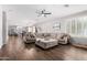 Spacious living room boasts an open floor plan, stylish furniture, and lots of natural light at 30246 N 123Rd Ln, Peoria, AZ 85383