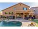 Backyard pool and covered patio create a serene outdoor oasis ideal for relaxation and entertainment at 3206 W Sentinel Rock Rd, Phoenix, AZ 85086