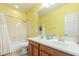 Bright bathroom features double sinks, a shower-tub combination, and clean, modern finishes at 3206 W Sentinel Rock Rd, Phoenix, AZ 85086