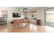 Spacious game room features a pool table, ceiling fan, and natural light at 3206 W Sentinel Rock Rd, Phoenix, AZ 85086
