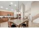 Eat-in kitchen includes an island, stainless steel appliances, and ample cabinets at 3206 W Sentinel Rock Rd, Phoenix, AZ 85086