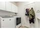 Functional laundry room with modern washer and dryer at 3206 W Sentinel Rock Rd, Phoenix, AZ 85086
