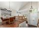 Open-concept living space with views of the dining area and front entrance at 3206 W Sentinel Rock Rd, Phoenix, AZ 85086