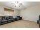Spacious living room featuring a ceiling fan and comfortable seating at 3206 W Sentinel Rock Rd, Phoenix, AZ 85086