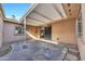 Outdoor patio, concrete flooring, covered patio, and gated door to alley way at 3220 W Laurie Ln, Phoenix, AZ 85051