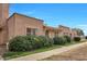 Inviting townhome with a well-maintained front garden at 3220 W Laurie Ln, Phoenix, AZ 85051