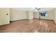 Bright living room boasts wood floors and neutral paint at 3220 W Laurie Ln, Phoenix, AZ 85051