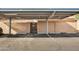 Covered parking spaces with numbered carports at 3220 W Laurie Ln, Phoenix, AZ 85051