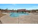 Community pool with lounge seating and tables at 3220 W Laurie Ln, Phoenix, AZ 85051