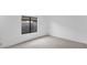 Bright bedroom with carpet flooring and window view at 3305 E Hononegh Dr, Phoenix, AZ 85050