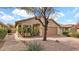 Charming single-story home with well-maintained landscaping and a two-car garage at 3305 E Hononegh Dr, Phoenix, AZ 85050