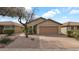Charming single-story home with a well-manicured yard and inviting curb appeal at 3305 E Hononegh Dr, Phoenix, AZ 85050