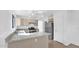 Well-lit kitchen featuring stainless steel appliances and bright granite countertops at 3305 E Hononegh Dr, Phoenix, AZ 85050