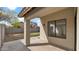 Outdoor patio area with a concrete floor and views of the backyard at 3305 E Hononegh Dr, Phoenix, AZ 85050