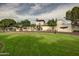 Stately clubhouse with manicured lawn and a porte-cochere in a beautiful community setting at 3310 E Fremont Rd, Phoenix, AZ 85042