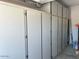 Organized garage with plenty of built-in storage cabinets, maximizing space and functionality at 3310 E Fremont Rd, Phoenix, AZ 85042