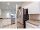 Open kitchen featuring stainless steel appliances, granite countertops and white cabinetry at 3310 E Fremont Rd, Phoenix, AZ 85042