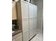 Kitchen pantry with white cabinets, granite countertops at 3310 E Fremont Rd, Phoenix, AZ 85042