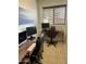Office with desk, office chairs, tile flooring and window with blinds at 3310 E Fremont Rd, Phoenix, AZ 85042