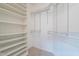 Walk-in closet with shelving and carpet flooring at 3310 E Fremont Rd, Phoenix, AZ 85042