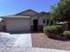 Charming single-story home with a well-manicured lawn and a two-car garage, offering great curb appeal at 3717 E Lodgepole Dr, Gilbert, AZ 85298