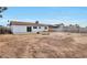 Large private backyard, cinder block fence, with back of house view at 3718 W Columbine Dr, Phoenix, AZ 85029