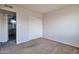 Bedroom with ensuite bathroom access, closet, and simple design at 3718 W Columbine Dr, Phoenix, AZ 85029