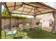 Relaxing backyard gazebo featuring comfortable seating and providing shade and style at 42410 N 46Th Ln, Phoenix, AZ 85086