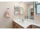 Clean bathroom features vanity with a single sink and modern fixtures at 42410 N 46Th Ln, Phoenix, AZ 85086