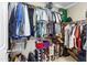 Walk-in closet with plenty of storage space for hanging and folded clothes at 42410 N 46Th Ln, Phoenix, AZ 85086