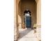 Inviting front entryway with arched details, stone accents, and a welcoming atmosphere at 42410 N 46Th Ln, Phoenix, AZ 85086