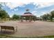 Charming gazebo with seating in a beautifully landscaped park setting at 42410 N 46Th Ln, Phoenix, AZ 85086