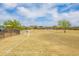 Grassy soccer field with goals under a partly cloudy sky in a neighborhood setting at 42410 N 46Th Ln, Phoenix, AZ 85086