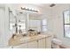 Bright bathroom with double sink vanity and large mirror at 4670 W Linda Ln, Chandler, AZ 85226