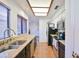Bright kitchen with tile floors, stainless steel appliances, wood blinds, and light countertops at 4670 W Linda Ln, Chandler, AZ 85226