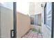 Enclosed outdoor patio with brick flooring, exterior wall and limited lighting at 4670 W Linda Ln, Chandler, AZ 85226